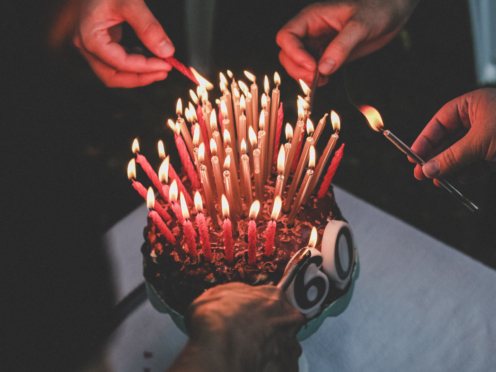 Birthday cake with lots of candles for ageing workforce