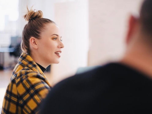 Man and woman having career conversation